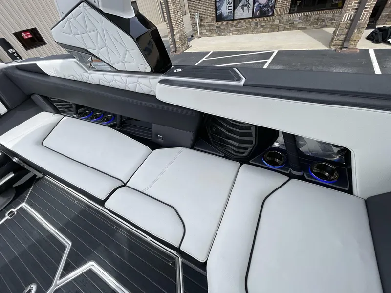 Slide: The Image of 2023 Nautique Super Air Nautique G25 Paragon interior with luxurious seating and modern design. - 22