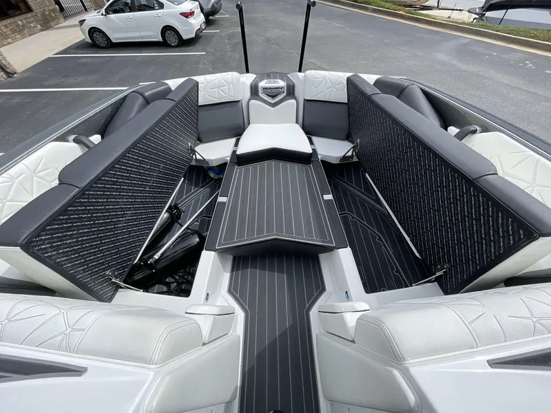 Slide: The Image of 2023 Nautique Super Air Nautique G25 Paragon interior with luxurious seating and sleek design. - 32