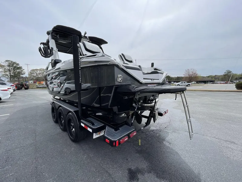 Slide: The Image of 2023 Nautique Super Air Nautique G25 Paragon boat on trailer, rear view. - 5