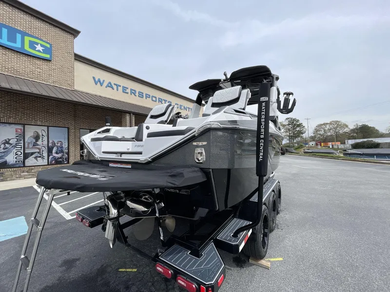 Slide: The Image of 2023 Nautique Super Air Nautique G25 Paragon boat at watersport rental facility. - 9