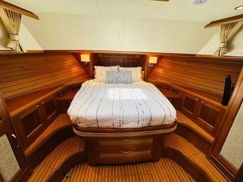 Slide: The Image of Luxurious cabin interior of 2014 Grand Banks 46 Eastbay SX yacht with cozy bed. - 41