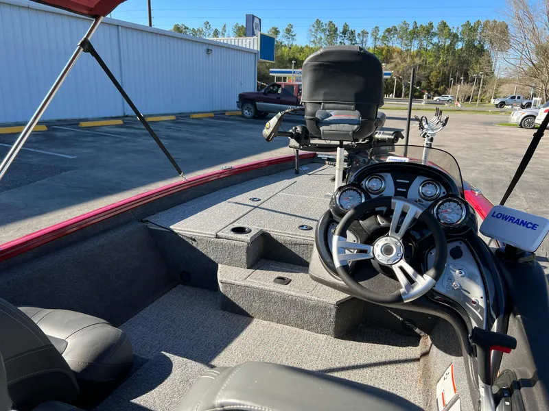 Slide: The Image of Bass Tracker Pro Team 175 boat interior, 2022 model, featuring steering wheel and control panel. - 18