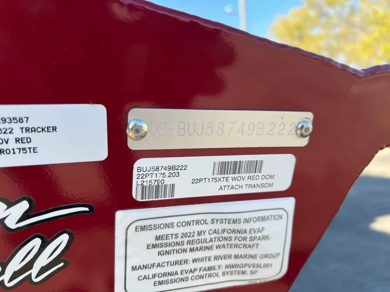 Slide: The Image of 2022 Bass Tracker Pro Team 175 boat identification and emissions labels. - 25