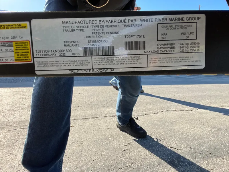 Slide: The Image of Label on Bass Tracker Pro Team 175 trailer, 2022 model, showing specifications and manufacturing details. - 26