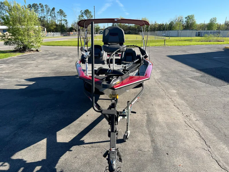 Slide: The Image of 2022 Bass Tracker Pro Team 175 boat on trailer, parked outdoors. - 3