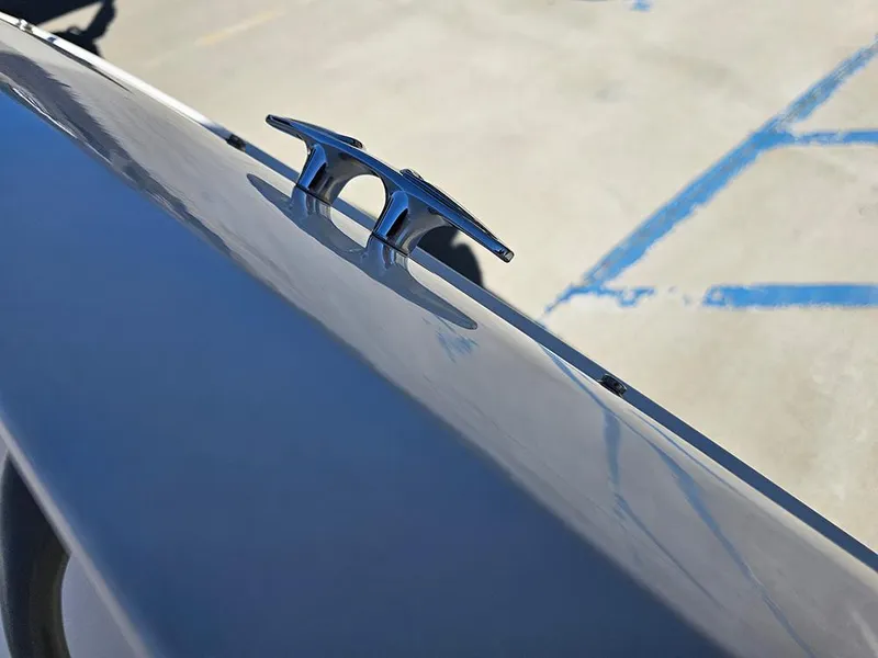 Slide: The Image of 2021 Bayliner Element E18 boat cleat on a sunny day. - 21