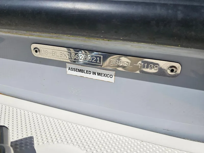 Slide: The Image of 2021 Bayliner Element E18 boat identification plate, assembled in Mexico. - 23