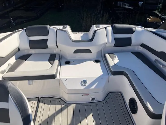 Slide: The Image of 2024 Yamaha Boats 195S interior seating with sleek design and comfortable upholstery. - 9