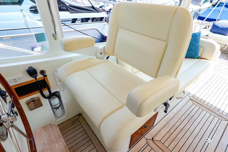Slide: The Image of Luxurious helm seat on 2010 MJM 40z Downeast yacht with teak flooring. - 29