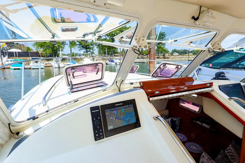 Slide: The Image of Cockpit view of 2010 MJM 40z Downeast boat with navigation system and open hatches. - 32