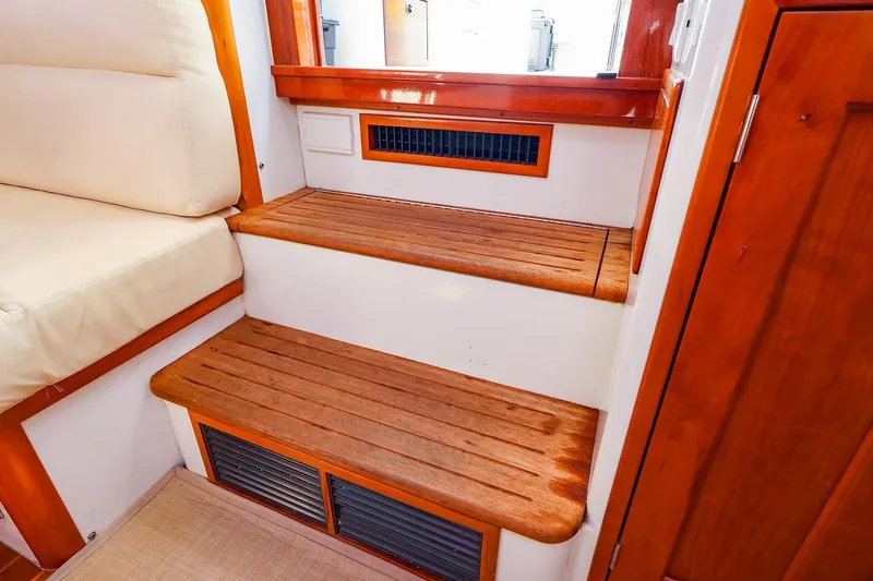 Slide: The Image of Interior of 2010 MJM 40z Downeast boat with wooden steps and seating. - 35