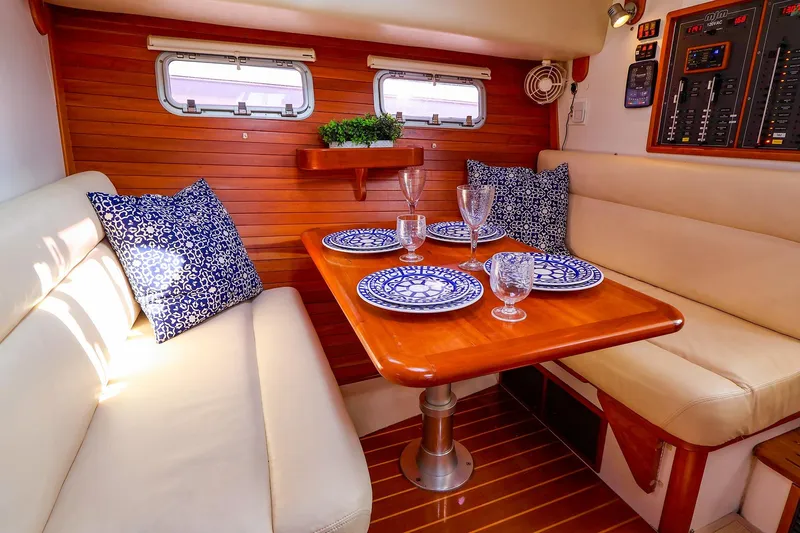 Slide: The Image of Luxurious 2010 MJM 40z Downeast yacht interior with elegant dining area and nautical decor. - 38