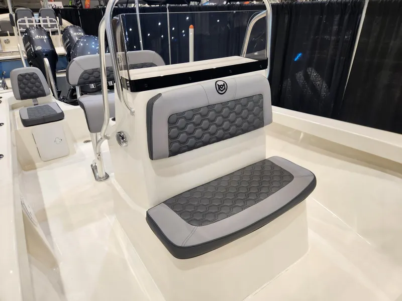 Slide: The Image of 2025 May-Craft 192 CC boat with Yamaha engine on trailer, parked outdoors. - 4