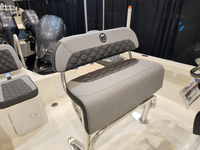 Slide: The Image of 2025 May-Craft 192 CC boat console with steering wheel and controls. - 8
