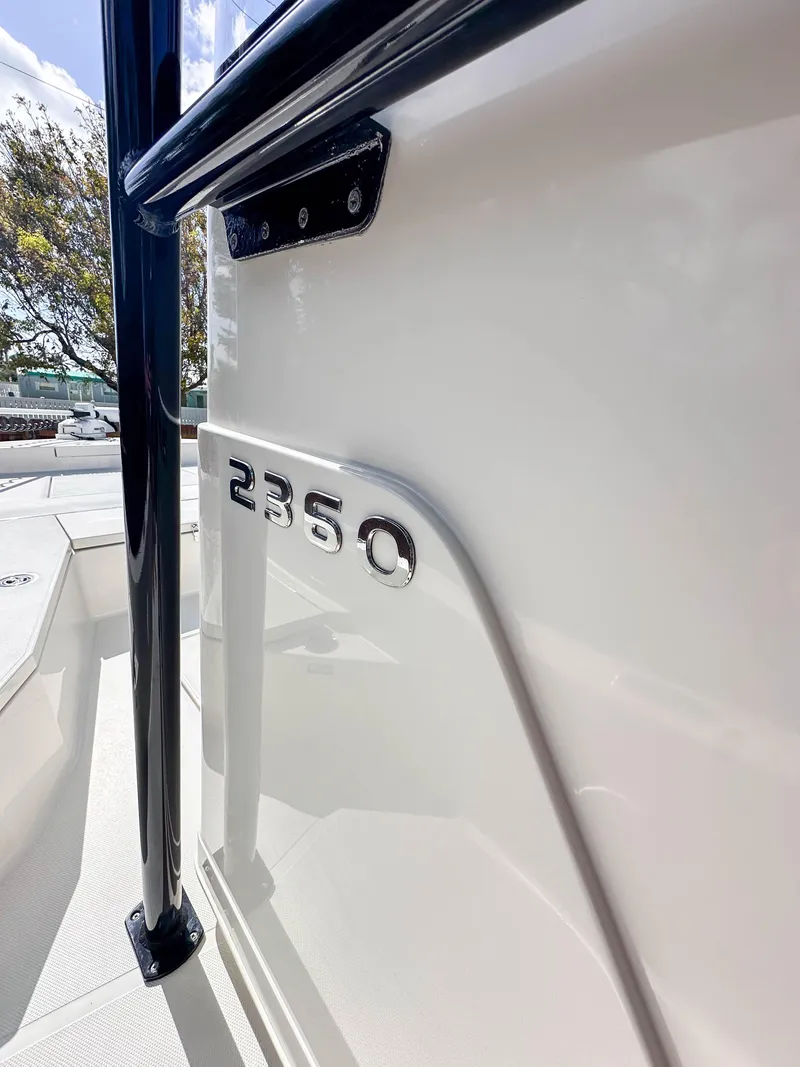 Slide: The Image of 2023 Ranger 2360 Bay boat, side view with model number detail. - 14