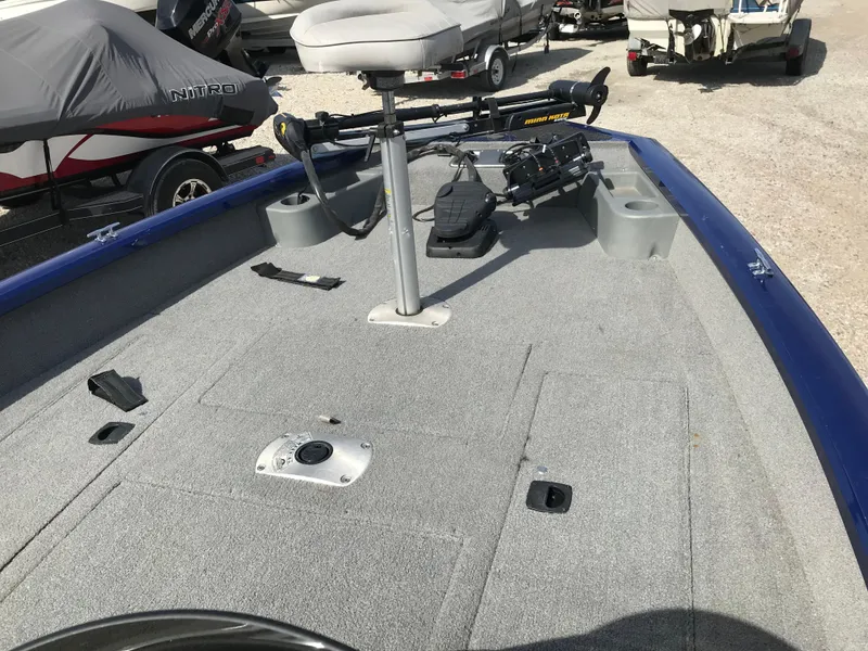Slide: The Image of 2012 Tracker Pro Team 175 TF boat deck with fishing seat and trolling motor. - 10