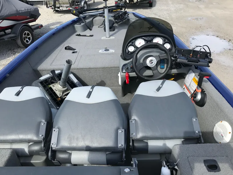 Slide: The Image of 2012 Tracker Pro Team 175 TF boat interior with steering console and seating. - 6