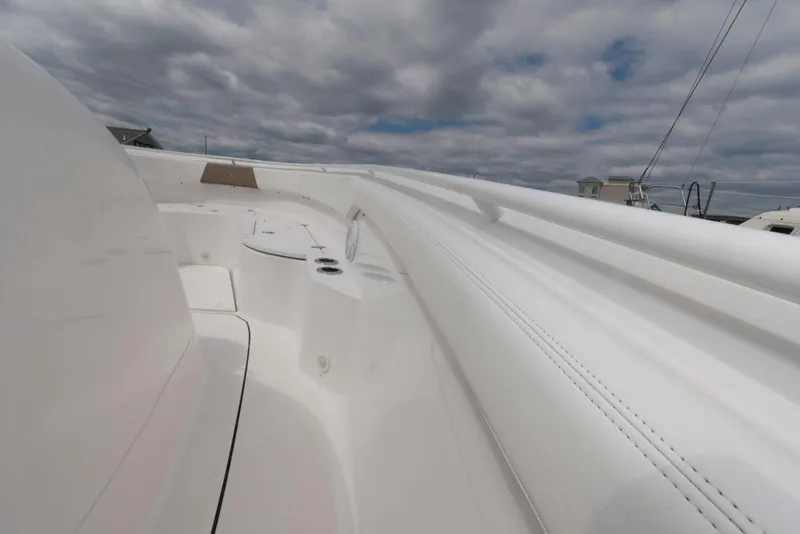 Slide: The Image of 2017 Edgewater 368CC boat deck under cloudy sky. - 26