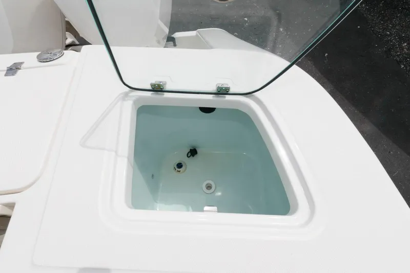 Slide: The Image of Livewell compartment on a 2017 Edgewater 368CC boat with open lid. - 30