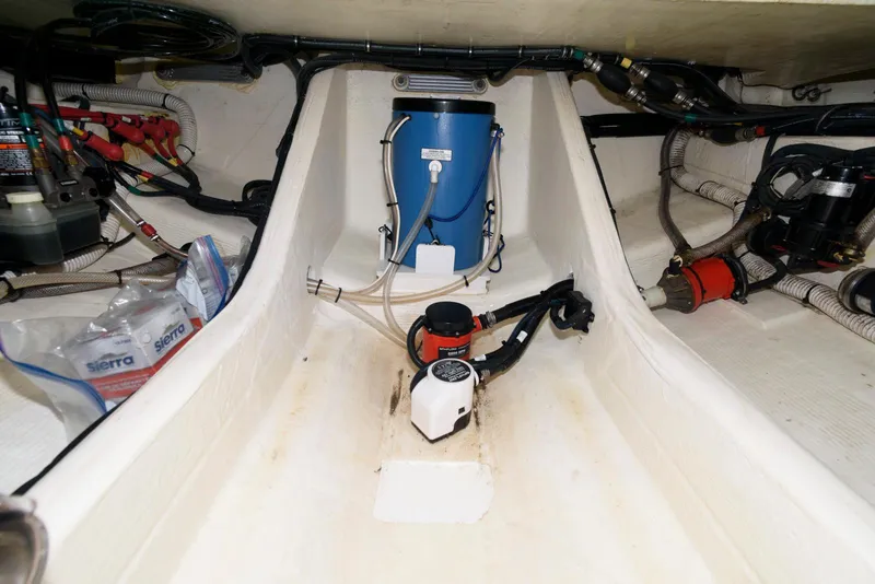 Slide: The Image of Interior view of 2017 Edgewater 368CC boat showing mechanical components and wiring. - 38