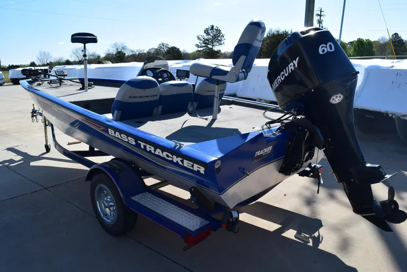Slide: The Image of 2006 Tracker Pro Team 175 TX bass boat with Mercury 60 engine on trailer. - 4