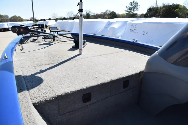 Slide: The Image of 2006 Tracker Pro Team 175 TX boat deck with fishing equipment and storage compartments. - 8