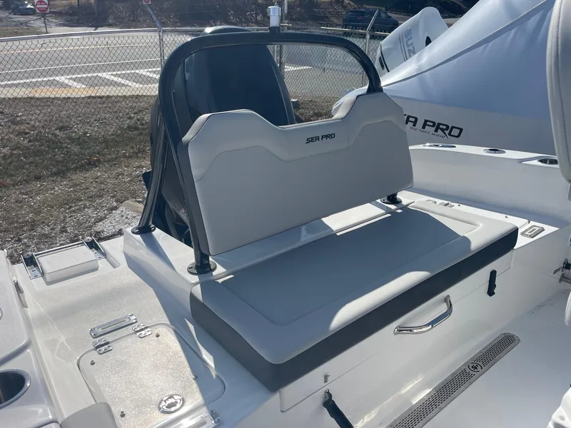 Slide: The Image of 2025 Sea Pro 225 Sandbar boat interior with seating and storage. - 18