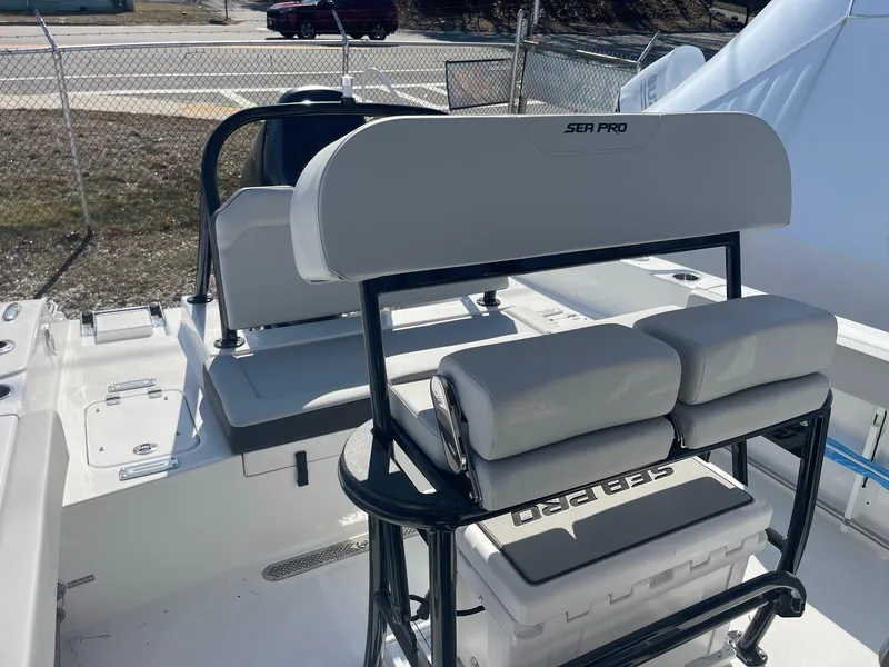 Slide: The Image of 2025 Sea Pro 225 Sandbar boat interior with seating and storage. - 20