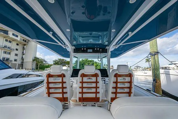 Slide: The Image of 2020 HCB 42 Lujo boat interior with luxurious seating and sleek design. - 13