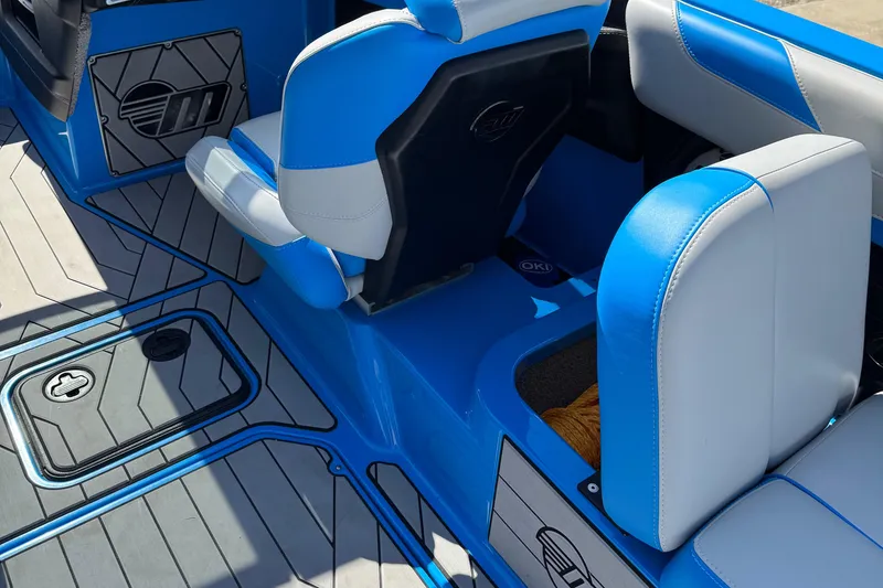 Slide: The Image of 2019 Malibu Wakesetter 23 LSV interior with blue and white seating and modern design. - 20