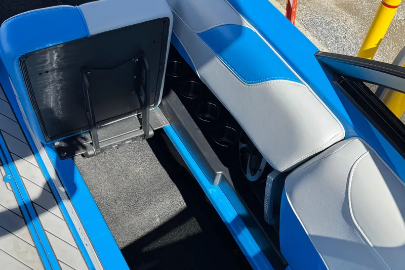 Slide: The Image of Interior of 2019 Malibu Wakesetter 23 LSV boat with blue and gray seating. - 21