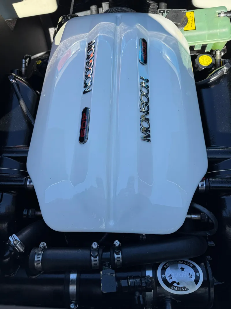 Slide: The Image of 2019 Malibu Wakesetter 23 LSV engine, featuring Monsoon branding. - 26