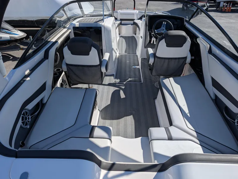 Slide: The Image of 2019 Yamaha Boats 242 Limited S interior with sleek seating and modern design. - 10