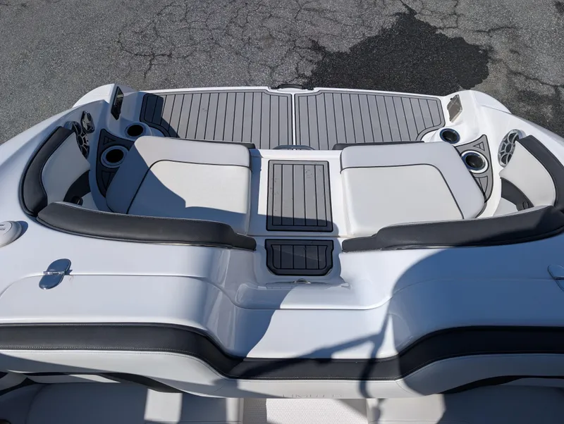Slide: The Image of 2019 Yamaha Boats 242 Limited S interior with sleek seating and cup holders. - 12