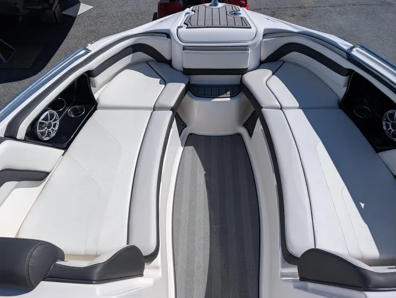 Slide: The Image of 2019 Yamaha Boats 242 Limited S interior with spacious seating and modern design. - 18