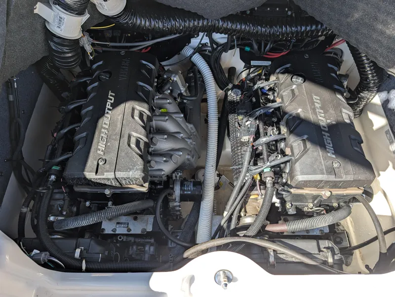 Slide: The Image of 2019 Yamaha Boats 242 Limited S engine compartment with twin high-output engines. - 22