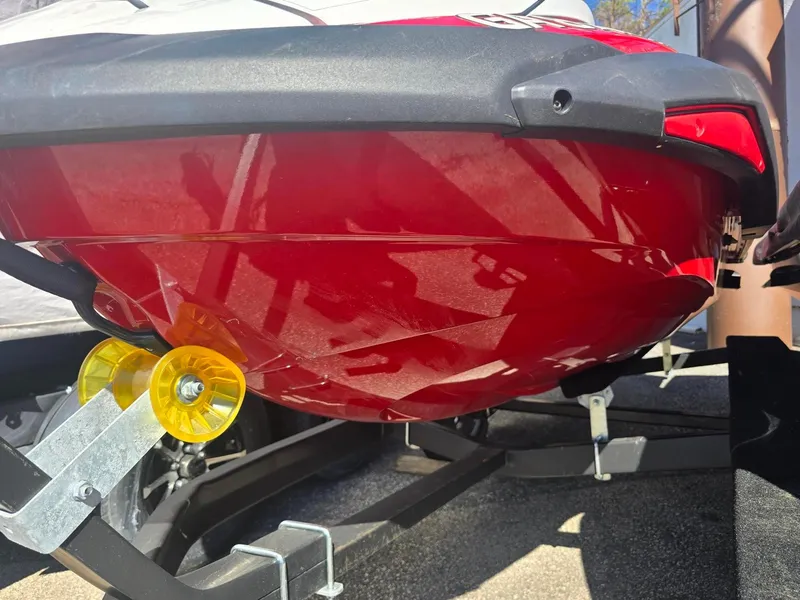 Slide: The Image of 2021 Yamaha WaveRunner FX Cruiser SVHO on trailer, red hull close-up. - 7