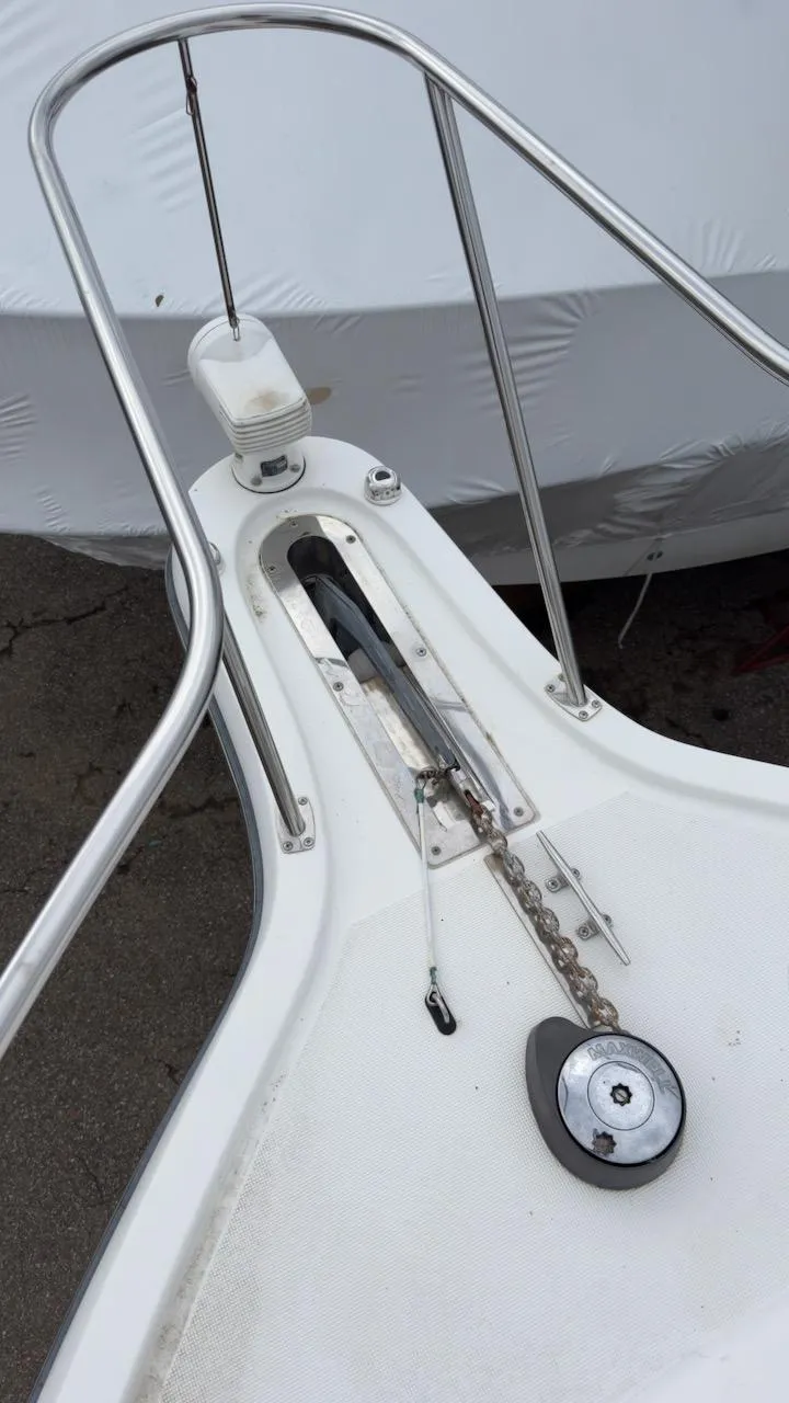 Slide: The Image of 2005 Tiara Yachts 2900 Open bow with anchor chain and railing. - 9