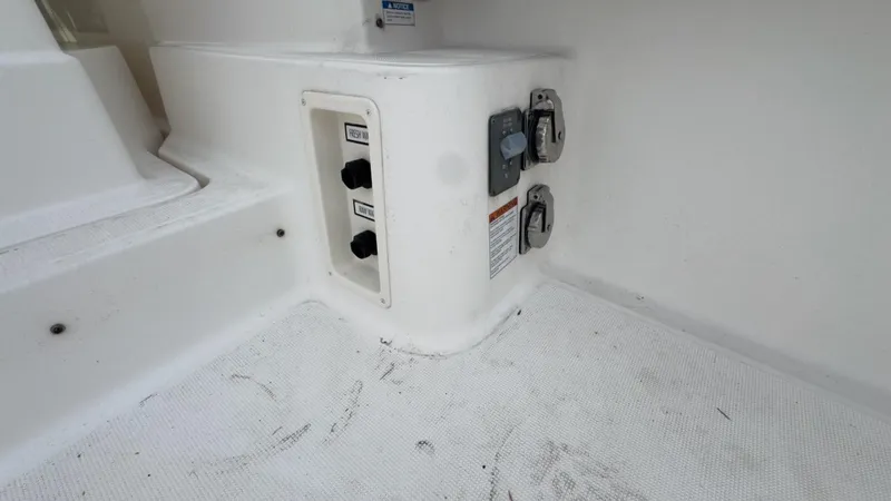 Slide: The Image of 2005 Tiara Yachts 2900 Open deck with utility connections and non-slip surface. - 10