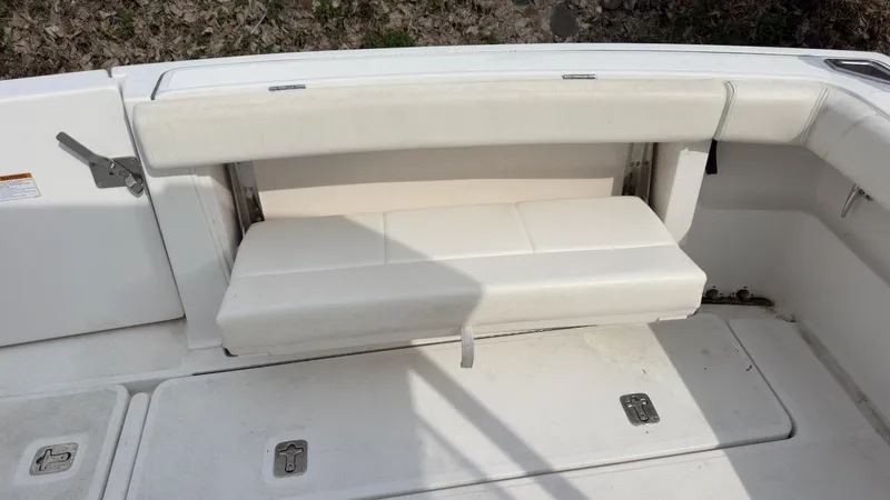 Slide: The Image of 2005 Tiara Yachts 2900 Open boat with foldable white bench seat. - 11