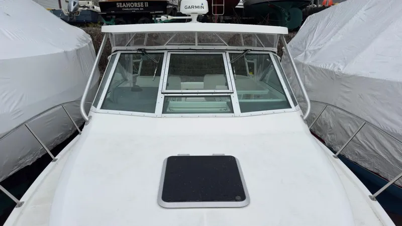 Slide: The Image of 2005 Tiara Yachts 2900 Open boat with covered deck and Garmin equipment. - 3
