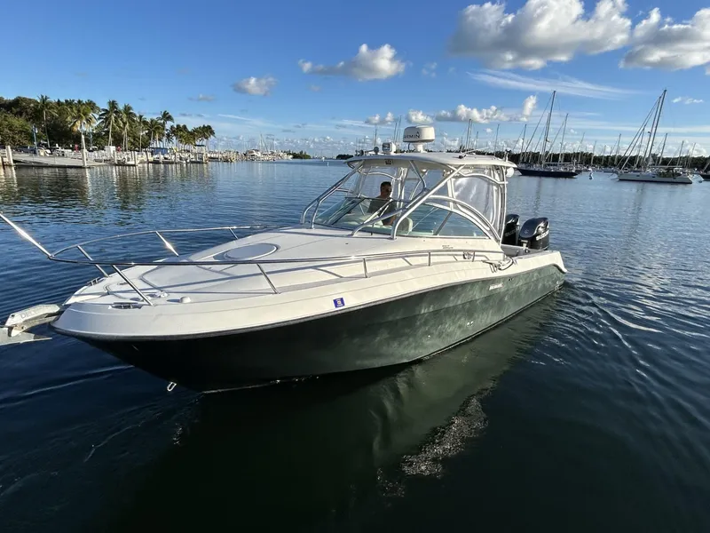 Slide: The Image of 2007 Hydra-Sports 2900 VX boat cruising on calm waters under a blue sky. - 1