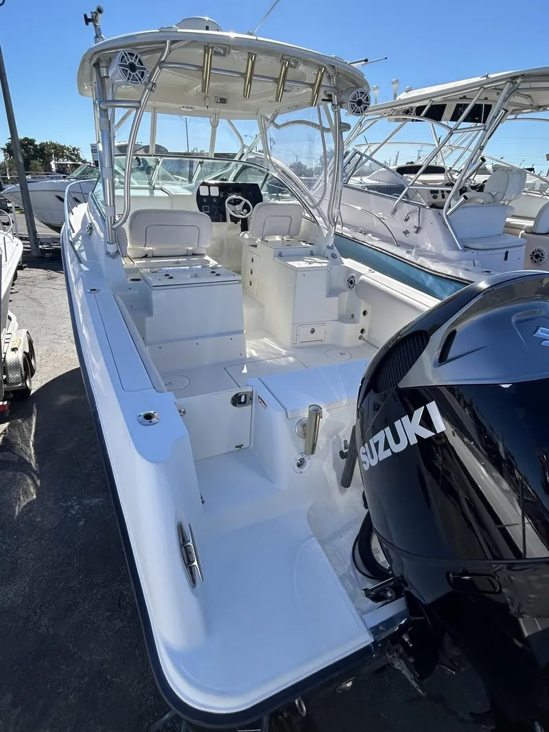Slide: The Image of 2007 Hydra-Sports 2900 VX boat with Suzuki engine, docked in marina. - 15