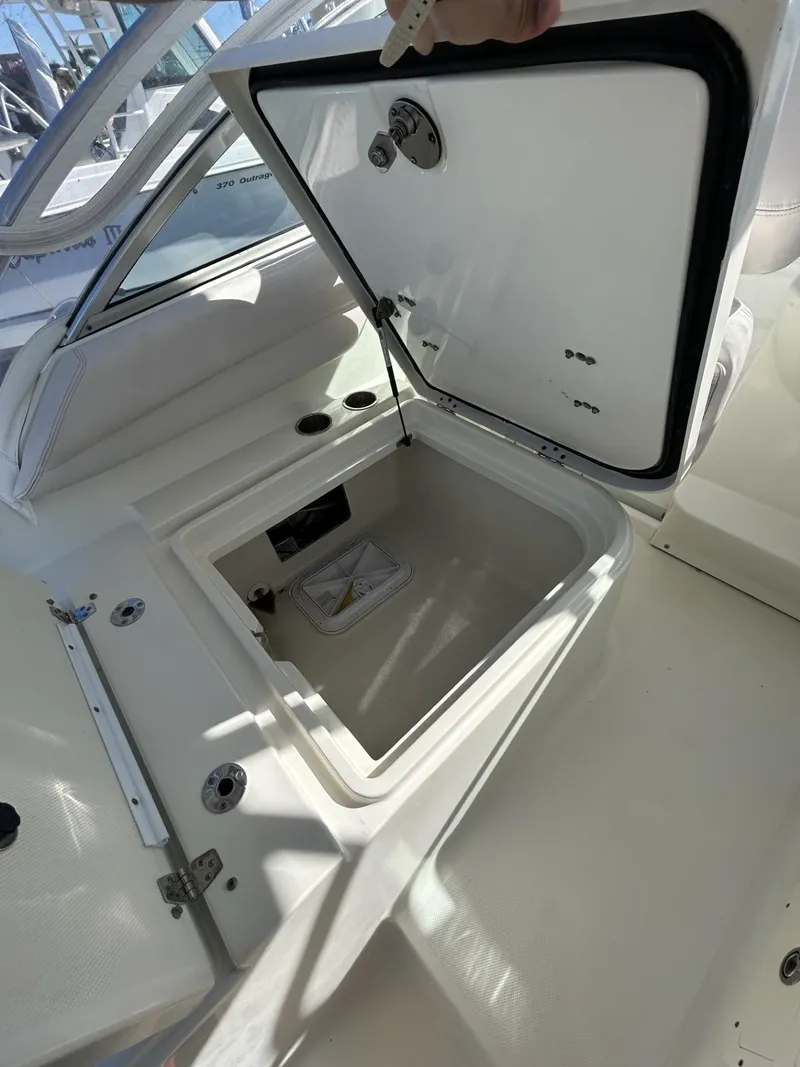 Slide: The Image of 2007 Hydra-Sports 2900 VX boat storage compartment open, showcasing interior space. - 20
