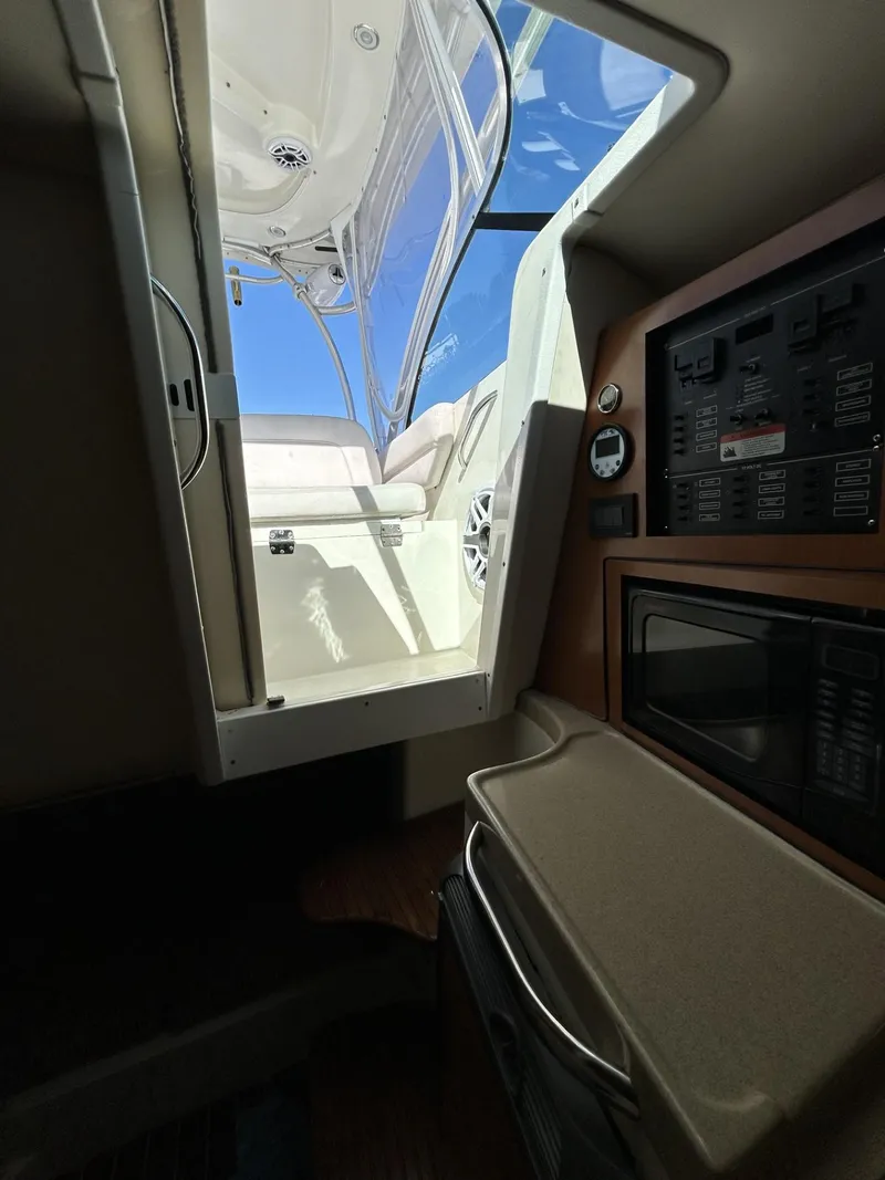 Slide: The Image of Interior view of 2007 Hydra-Sports 2900 VX boat, showing cabin and control panel. - 27
