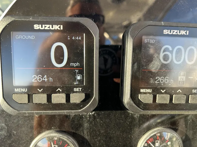 Slide: The Image of Dashboard of a 2007 Hydra-Sports 2900 VX with Suzuki displays showing speed and engine hours. - 8
