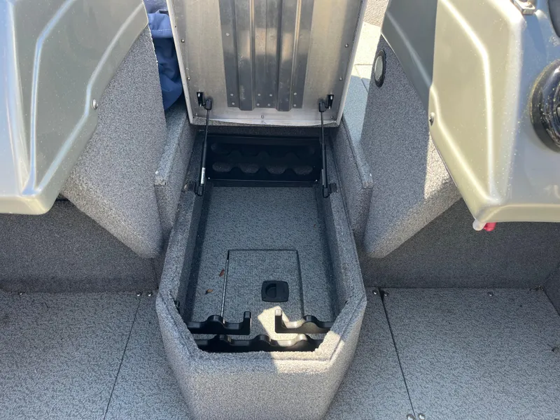 Slide: The Image of 2018 Tracker PRO GUIDE V165 WT boat interior storage compartment. - 14