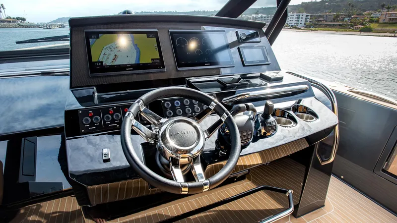 Slide: The Image of Helm of 2022 Pardo Yachts 50 with modern navigation displays and controls. - 19