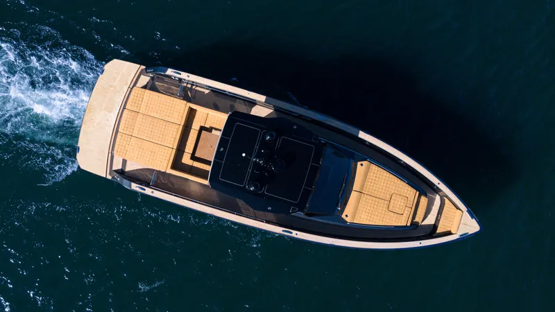 Slide: The Image of Aerial view of 2022 Pardo Yachts 50 cruising on open water. - 2