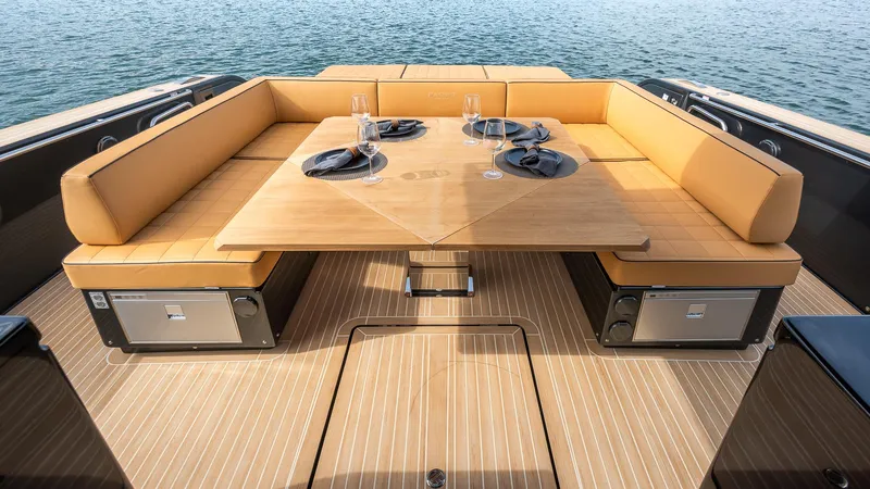 Slide: The Image of Luxurious 2022 Pardo Yachts 50 with elegant outdoor dining area and scenic ocean view. - 26